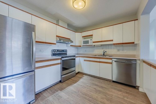 405 7725 108 Street, Edmonton, AB - Indoor Photo Showing Kitchen With Double Sink