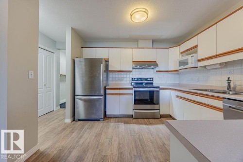 405 7725 108 Street, Edmonton, AB - Indoor Photo Showing Kitchen With Double Sink