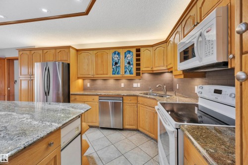 3410 135A Avenue, Edmonton, AB - Indoor Photo Showing Kitchen With Double Sink