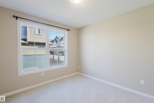 60 4029 Orchards Drive, Edmonton, AB - Indoor Photo Showing Other Room