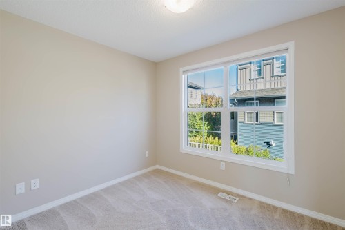 60 4029 Orchards Drive, Edmonton, AB - Indoor Photo Showing Other Room