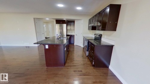 3236 17B Avenue, Edmonton, AB - Indoor Photo Showing Kitchen With Double Sink