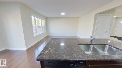 3236 17B Avenue, Edmonton, AB - Indoor Photo Showing Kitchen With Double Sink