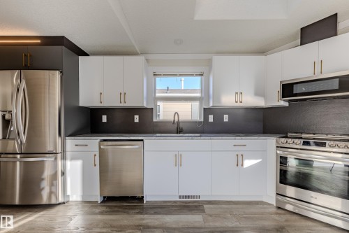514 Maple Wood Crescent Nw, Edmonton, AB - Indoor Photo Showing Kitchen With Stainless Steel Kitchen