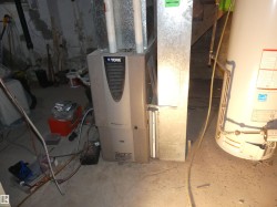 Utilities with gas water heater and heating unit - 