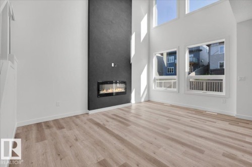 1154 Gyrfalcon Crescent, Edmonton, AB - Indoor With Fireplace
