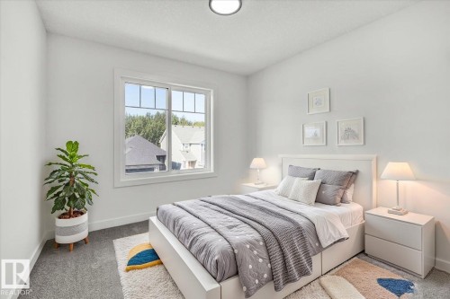 1154 Gyrfalcon Crescent, Edmonton, AB - Indoor Photo Showing Bedroom