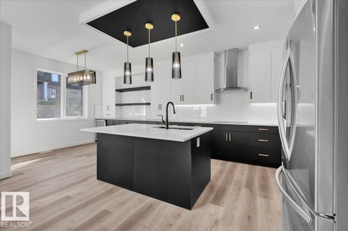 1154 Gyrfalcon Crescent, Edmonton, AB - Indoor Photo Showing Kitchen With Upgraded Kitchen