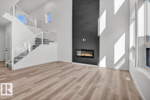 1154 Gyrfalcon Crescent, Edmonton, AB - Indoor With Fireplace