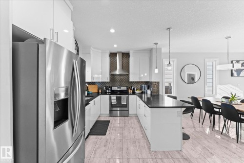 3510 48 Avenue, Beaumont, AB - Indoor Photo Showing Kitchen With Stainless Steel Kitchen With Upgraded Kitchen