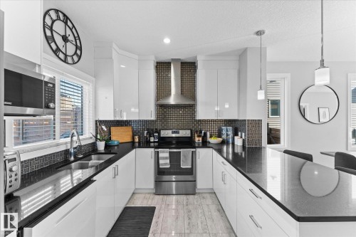 3510 48 Avenue, Beaumont, AB - Indoor Photo Showing Kitchen With Double Sink With Upgraded Kitchen