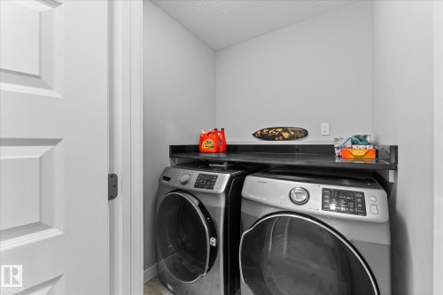 3510 48 Avenue, Beaumont, AB - Indoor Photo Showing Laundry Room