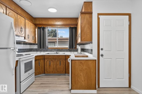 12410 134 Avenue, Edmonton, AB - Indoor Photo Showing Kitchen With Double Sink
