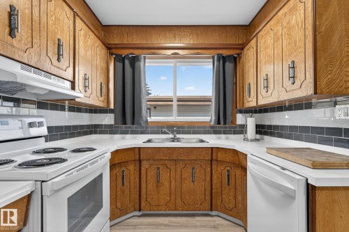 12410 134 Avenue, Edmonton, AB - Indoor Photo Showing Kitchen With Double Sink