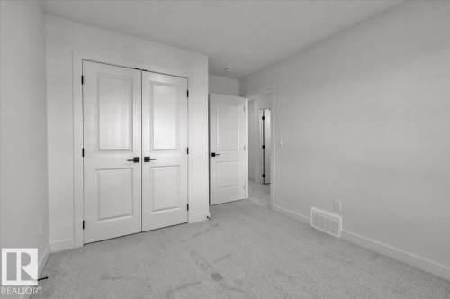 1115 Gyrfalcon Crescent, Edmonton, AB - Indoor Photo Showing Other Room