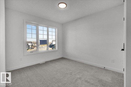 1115 Gyrfalcon Crescent, Edmonton, AB - Indoor Photo Showing Other Room