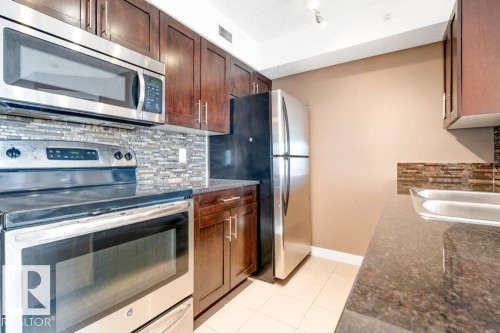403 11803 22 Avenue, Edmonton, AB - Indoor Photo Showing Kitchen With Double Sink