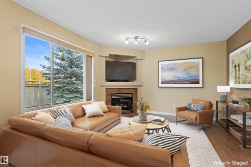63 1128 156 Street, Edmonton, AB - Indoor Photo Showing Living Room With Fireplace