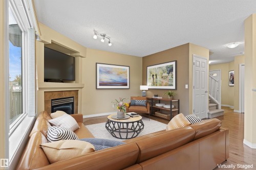 63 1128 156 Street, Edmonton, AB - Indoor Photo Showing Living Room With Fireplace