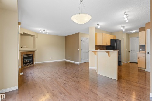 63 1128 156 Street, Edmonton, AB - Indoor Photo Showing Kitchen With Fireplace