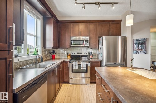 204 2588 Anderson Way, Edmonton, AB - Indoor Photo Showing Kitchen With Stainless Steel Kitchen With Double Sink