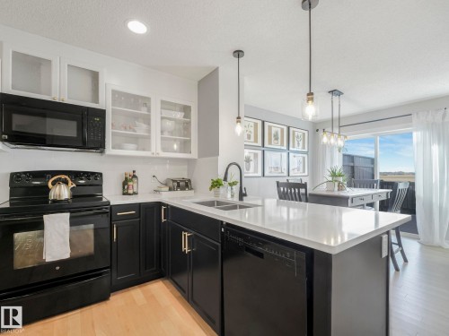 112 Santana Crescent, Fort Saskatchewan, AB - Indoor Photo Showing Kitchen With Double Sink With Upgraded Kitchen