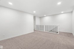 Unfurnished room featuring recessed lighting and carpet flooring - 
