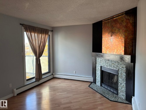 17 10721 116 Street, Edmonton, AB - Indoor With Fireplace