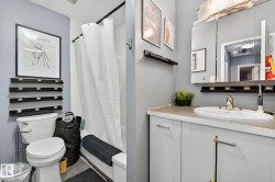 Bathroom with vanity and shower / bath combination with curtain - 