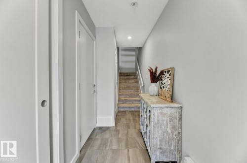 114 1304 Rutherford Rd, Edmonton, AB - Indoor Photo Showing Other Room