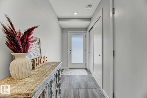 114 1304 Rutherford Rd, Edmonton, AB - Indoor Photo Showing Other Room