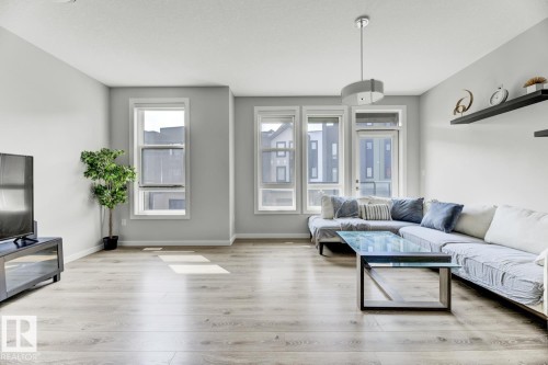 114 1304 Rutherford Rd, Edmonton, AB - Indoor Photo Showing Living Room