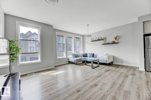 114 1304 Rutherford Rd, Edmonton, AB - Indoor Photo Showing Living Room