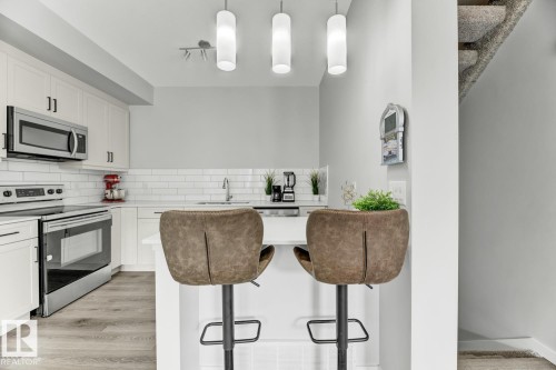 114 1304 Rutherford Rd, Edmonton, AB - Indoor Photo Showing Kitchen