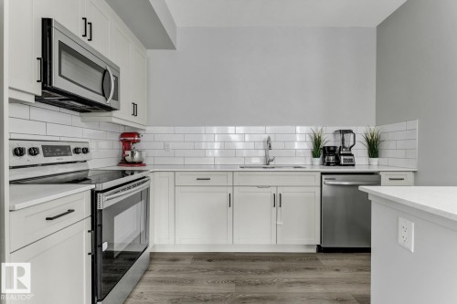114 1304 Rutherford Rd, Edmonton, AB - Indoor Photo Showing Kitchen