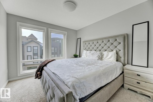 114 1304 Rutherford Rd, Edmonton, AB - Indoor Photo Showing Bedroom