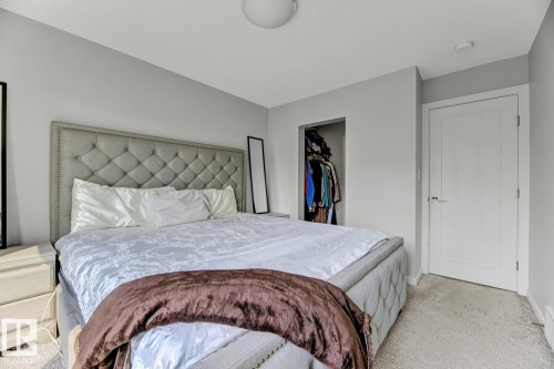 114 1304 Rutherford Rd, Edmonton, AB - Indoor Photo Showing Bedroom