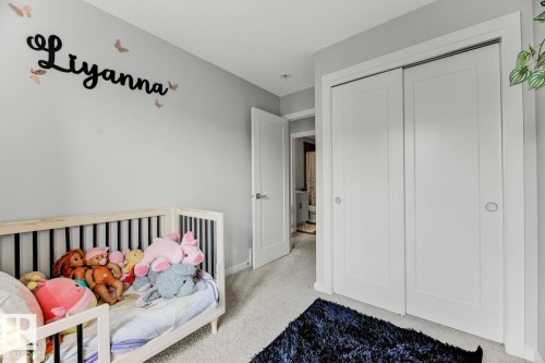 114 1304 Rutherford Rd, Edmonton, AB - Indoor Photo Showing Bedroom