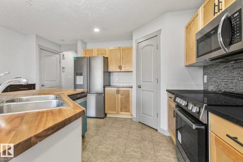40 14208 36 Street, Edmonton, AB - Indoor Photo Showing Kitchen With Double Sink