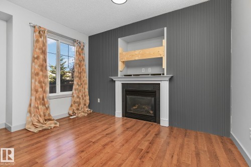 40 14208 36 Street, Edmonton, AB - Indoor Photo Showing Living Room With Fireplace