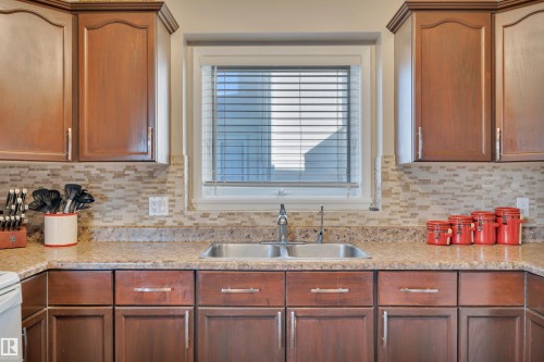 113 Pipestone Drive, Millet, AB - Indoor Photo Showing Kitchen With Double Sink