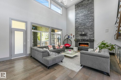 3510 Watson Point(E), Edmonton, AB - Indoor Photo Showing Living Room With Fireplace