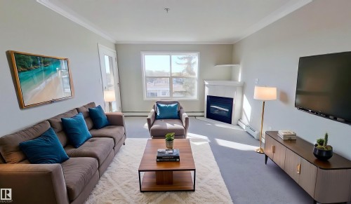 404 8315 83 Street, Edmonton, AB - Indoor Photo Showing Living Room With Fireplace
