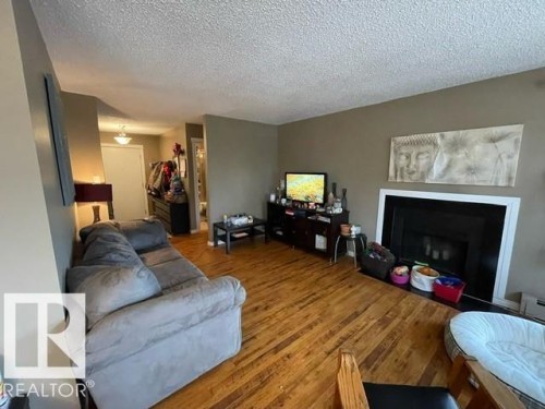 208 14803 51 Avenue, Edmonton, AB - Indoor Photo Showing Living Room
