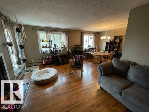 208 14803 51 Avenue, Edmonton, AB - Indoor Photo Showing Living Room