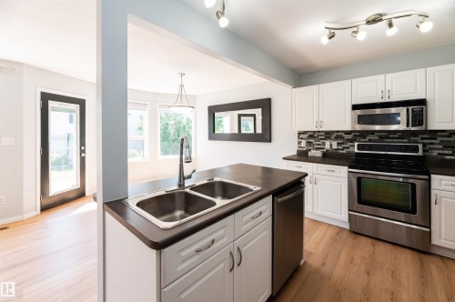 3729 138A Avenue, Edmonton, AB - Indoor Photo Showing Kitchen With Double Sink