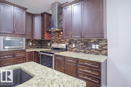 7913 Erasmus Crescent, Edmonton, AB - Indoor Photo Showing Kitchen