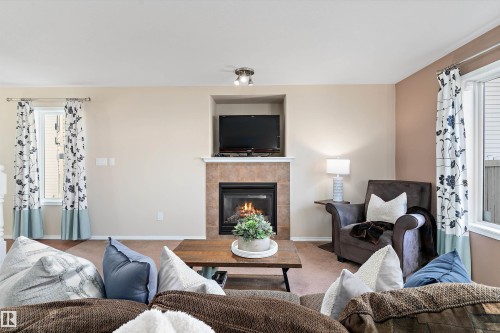 1510 37A Avenue, Edmonton, AB - Indoor Photo Showing Living Room With Fireplace