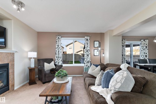 1510 37A Avenue, Edmonton, AB - Indoor Photo Showing Living Room With Fireplace