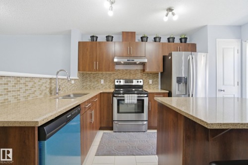 69 460 Hemingway Road, Edmonton, AB - Indoor Photo Showing Kitchen With Double Sink With Upgraded Kitchen